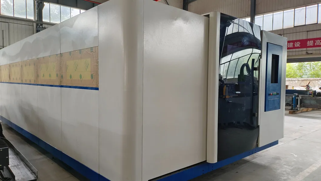 AC380V/50Hz/60Hz Power Supply Exchange Table Laser Cutting Machine with Enclosed Protective Cover 3000W Laser Power Mesin pemotong laser dengan tutup pelindung tertutup 4